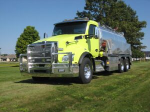 front end of fusion vacuum tanker-bright yellow cab