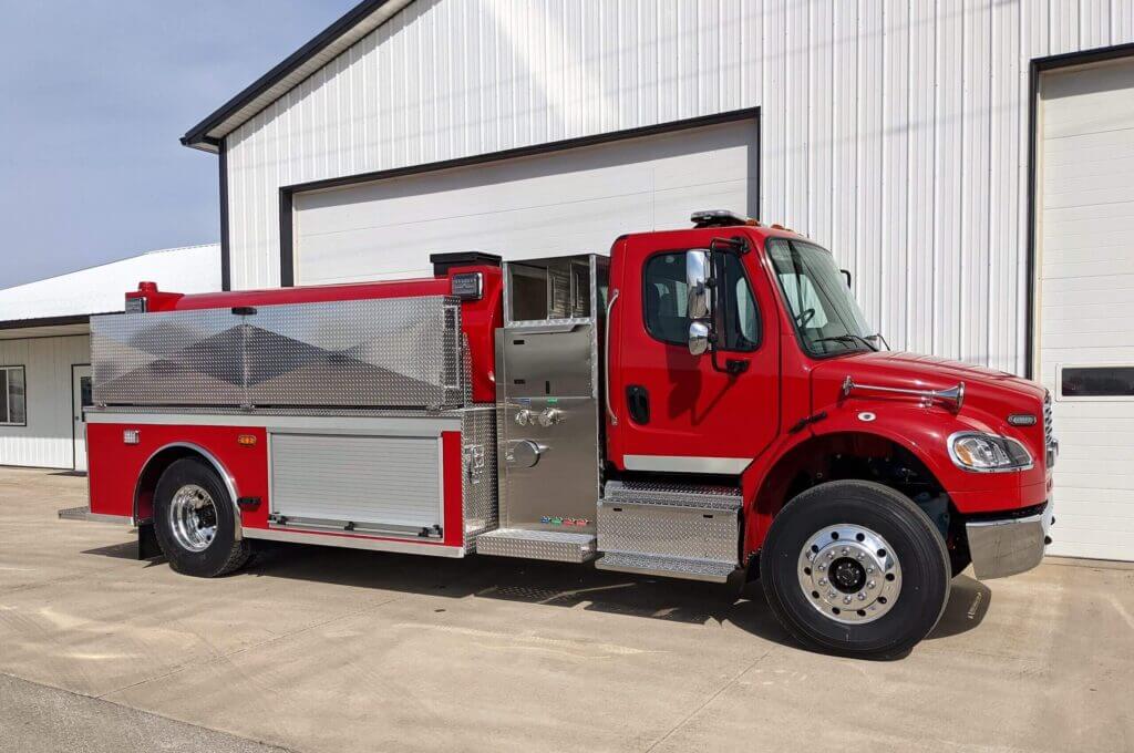 red dominator truck with stainless steel accessories